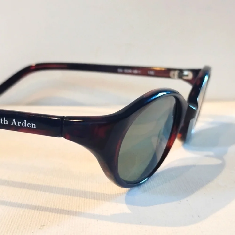 Elizabeth Arden Tortoiseshell Frame Sunglasses with Green Lenses